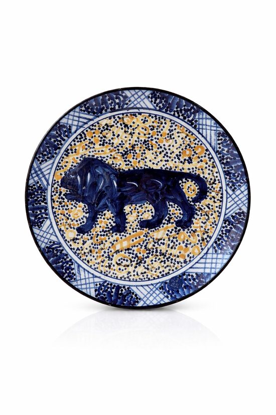 Dekoratīvs šķīvis ar lauvas attēlu